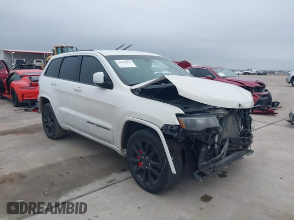 2018 Jeep Grand Cherokee Laredo E with VIN 1C4RJEAG0JC218694, listed as a IAAI auction lot 41587665 with 97,618 mi miles. Bid and sale history available at carsss.com. Image 1.