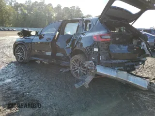 2020 BMW X5 M50i with VIN 5UXJU4C05LLE45415, listed as a Copart auction lot 80190304 with Not Provided miles and Salvage Title. Bid and sale history available at DreamBid. Image 2.
