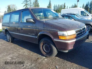 1993 Dodge Grand Caravan with VIN 1B4GK44R4PX675504, listed as a IAAI auction lot 42010737 with 219,886 mi miles and . Bid and sale history available at DreamBid. Image 1.