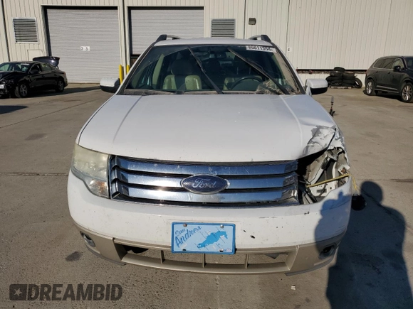 2008 Ford Taurus X Eddie Bauer with VIN 1FMDK07W78GA16734, listed as a Copart auction lot 86011354 with 214,429 mi miles and Salvage title. Bid and sale history available at DreamBid. Image 5.