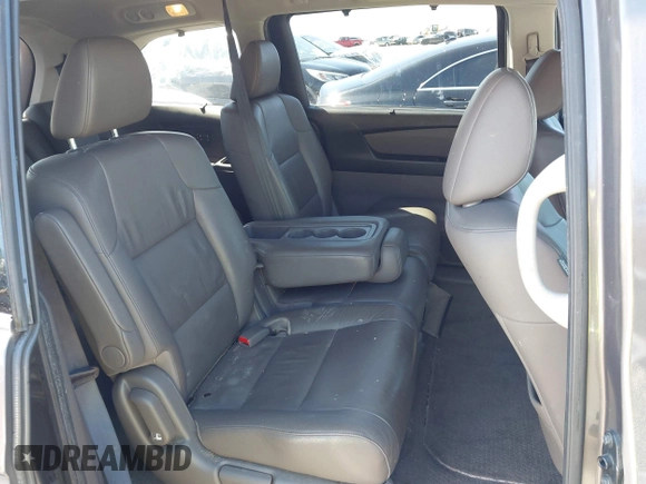 2012 Honda Odyssey Touring with VIN 5FNRL5H91CB057344, listed as a IAAI auction lot 41835272 with 158,854 mi miles. Bid and sale history available at carsss.com. Image 8.
