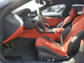 2025 BMW 8 Series M850i with VIN WBAGV8C07SCT18237, listed as a Copart auction lot 49277375 with 750 mi miles and Salvage title. Bid and sale history available at DreamBid. Image 7.
