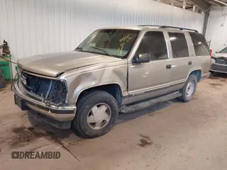 1999 Chevrolet Tahoe Z71 with VIN 1GNEK13R7XJ577796, listed as a IAAI auction lot 41036617 with 231,795 mi miles and . Bid and sale history available at DreamBid. Image 2.