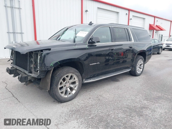 2015 GMC Yukon XL SLT with VIN 1GKS2HKC6FR746809, listed as a IAAI auction lot 41559570 with 144,401 mi miles. Bid and sale history available at carsss.com. Image 2.