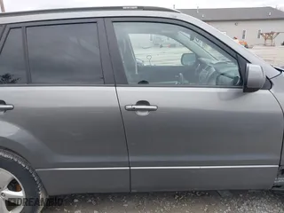 2010 Suzuki Grand Vitara Limited with VIN JS3TE0D73A4100191, listed as a IAAI auction lot 41716351 with 71,656 mi miles. Bid and sale history available at carsss.com. Image 12.