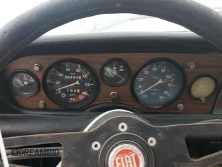 1978 FIAT 124 Spider z VIN 124CS10126825, wystawiony jako Copart lot #75075504 z przebiegiem 94 895 mil mil oraz Szkoda całkowita • Salvage title. Historia ofert i sprzedaży dostępna na DreamBid. Obrazek 9.