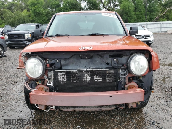 2010 Jeep Patriot Sport z VIN 1J4NF2GB8AD557735, wystawiony jako Copart lot #56532175 z przebiegiem 160 576 mil mil oraz Szkoda całkowita • Salvage title. Historia ofert i sprzedaży dostępna na DreamBid. Obrazek 5.
