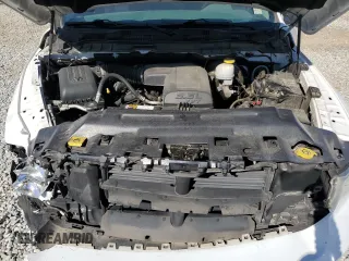 2018 Ram 1500 Tradesman z VIN 1C6RR6FG1JS211256, wystawiony jako Copart lot #49769185 z przebiegiem 171 115 mil mil oraz Szkoda całkowita • Salvage title. Historia ofert i sprzedaży dostępna na DreamBid. Obrazek 11.