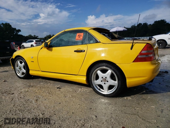 1999 Mercedes-Benz SLK-Class with VIN WDBKK47F9XF076441, listed as a Copart auction lot 73745154 with 104,481 mi miles and Salvage Title. Bid and sale history available at carsss.com. Image 2.