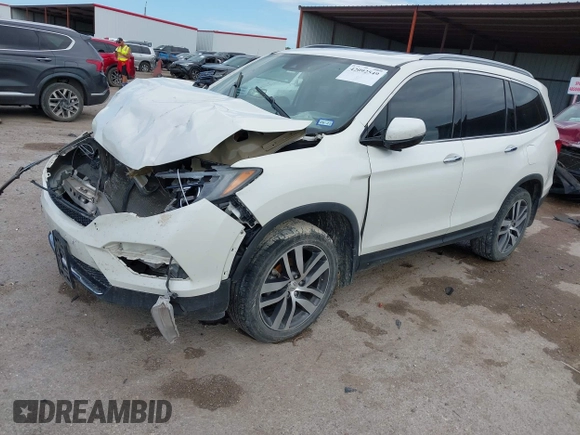 2017 Honda Pilot Touring with VIN 5FNYF6H9XHB034001, listed as a IAAI auction lot 42092549 with 142,422 mi miles and . Bid and sale history available at DreamBid. Image 17.