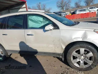 2012 Chevrolet Traverse 1LT with VIN 1GNKRGED4CJ323797, listed as a IAAI auction lot 41267339 with 142,463 mi miles and . Bid and sale history available at DreamBid. Image 12.