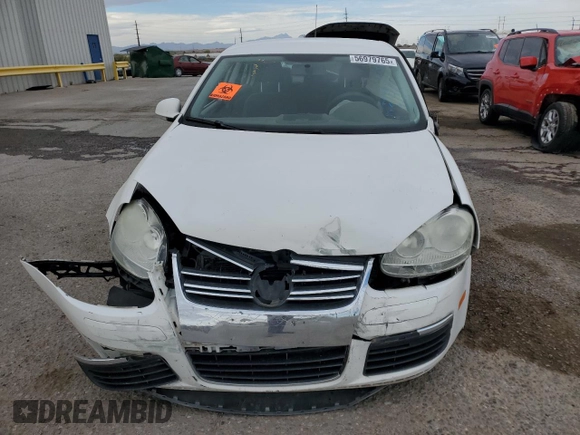 2009 Volkswagen Jetta S with VIN 3VWJM71K69M035974, listed as a Copart auction lot 56979765 with Not provided miles and Salvage title. Bid and sale history available at DreamBid. Image 5.