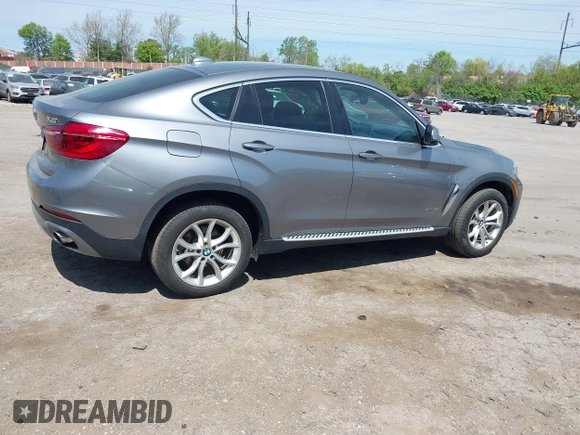 2016 BMW X6 xDrive35i with VIN 5UXKU2C53G0N84273, listed as a IAAI auction lot 42104112 with 61,183 mi miles and . Bid and sale history available at DreamBid. Image 4.