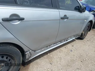 2010 Mitsubishi Lancer DE z VIN JA32U1FU7AU008019, wystawiony jako IAAI lot #42181672 z przebiegiem 227 360 mil mil oraz . Historia ofert i sprzedaży dostępna na DreamBid. Obrazek 16.