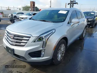 2017 Cadillac XT5 FWD with VIN 1GYKNARS7HZ144148, listed as a IAAI auction lot 41392399 with 96,252 mi miles and . Bid and sale history available at carsss.com. Image 18.