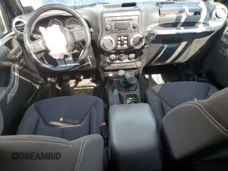 2013 Jeep Wrangler Unlimited Rubicon with VIN 1C4BJWFG5DL572795, listed as a Copart auction lot 62132425 with 149,695 mi miles and Salvage title. Bid and sale history available at DreamBid. Image 8.