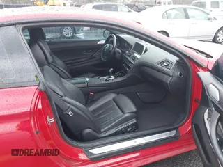 2013 BMW 6 Series 650i with VIN WBAYM9C53DDW20243, listed as a IAAI auction lot 41762838 with 100,905 mi miles and . Bid and sale history available at carsss.com. Image 5.
