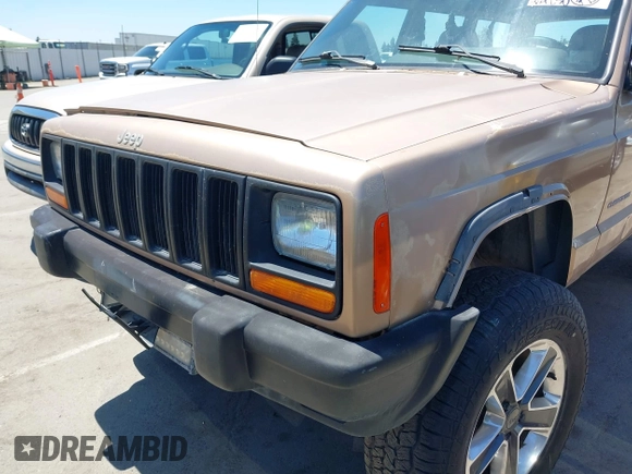 1999 Jeep Cherokee SE with VIN 1J4FF28S4XL592788, listed as a IAAI auction lot 42560002 with 189,258 mi miles and . Bid and sale history available at DreamBid. Image 6.