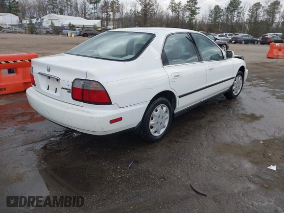 1996 Honda Accord LX with VIN 1HGCD5633TA266516, listed as a IAAI auction lot 41839684 with 162,523 mi miles and . Bid and sale history available at carsss.com. Image 4.