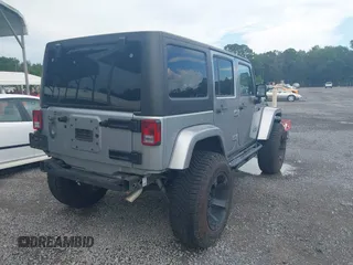 2016 Jeep Wrangler Unlimited Sahara with VIN 1C4BJWEG5GL117872, listed as a IAAI auction lot 42692798 with 119,819 mi miles and . Bid and sale history available at DreamBid. Image 4.