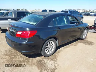 2010 Chrysler Sebring Limited with VIN 1C3CC5FB8AN140459, listed as a IAAI auction lot 41657740 with 199,682 mi miles and . Bid and sale history available at DreamBid. Image 4.