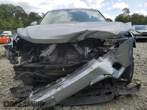 2020 Volkswagen Tiguan SE with VIN 3VV2B7AX4LM022562, listed as a Copart auction lot 69816034 with 61,789 mi miles and Salvage Title. Bid and sale history available at DreamBid. Image 5.