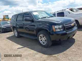 2012 Chevrolet Tahoe Commercial z VIN 1GNLC2E02CR239906, wystawiony jako IAAI lot #42238204 z przebiegiem 150 089 mil mil oraz . Historia ofert i sprzedaży dostępna na DreamBid. Obrazek 1.