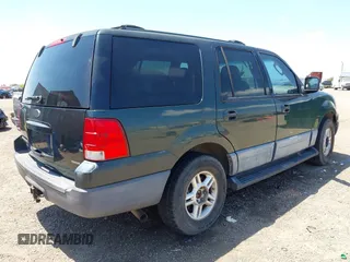 2004 Ford Expedition Special Service with VIN 1FMPU16L74LA64899, listed as a IAAI auction lot 41964679 with 178,369 mi miles. Bid and sale history available at carsss.com. Image 4.