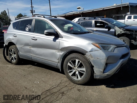2018 Toyota RAV4 XLE with VIN JTMRFREV6JD244065, listed as a Copart auction lot 49099265 with 121,698 mi miles and Salvage Title. Bid and sale history available at carsss.com. Image 4.