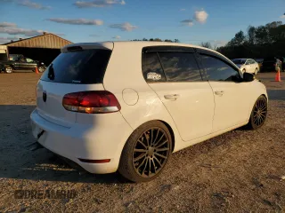 2014 Volkswagen Golf с VIN WVWDB7AJXEW009238, выставлен на аукционе Copart как лот 65533794 с пробегом 131 769 миль миль и Списание • Salvage title. История ставок и продаж доступна на DreamBid. Изображение 3.