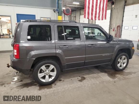 2016 Jeep Patriot High Altitude with VIN 1C4NJRFB5GD697474, listed as a Copart auction lot 57881215 with 152,127 mi miles and Salvage title. Bid and sale history available at DreamBid. Image 3.