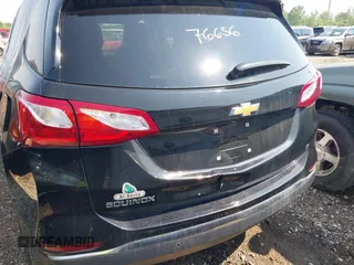 2019 Chevrolet Equinox LT z VIN 2GNAXKEV8K6130321, wystawiony jako IAAI lot #41276656 z przebiegiem 100 136 mil mil oraz . Historia ofert i sprzedaży dostępna na DreamBid. Obrazek 17.