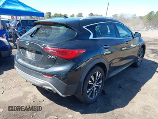 2018 Infiniti QX30 Premium with VIN SJKCH5CR7JA052747, listed as a IAAI auction lot 41993713 with 102,107 mi miles and . Bid and sale history available at DreamBid. Image 4.