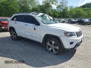 2014 Jeep Grand Cherokee Limited with VIN 1C4RJFBGXEC325357, listed as a Copart auction lot 61993715 with 156,718 mi miles and Salvage title. Bid and sale history available at DreamBid. Image 4.