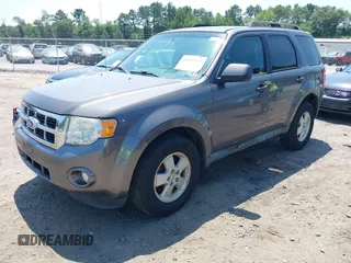 2011 Ford Escape XLT with VIN 1FMCU9D79BKC11522, listed as a IAAI auction lot 42844398 with 223,666 mi miles and . Bid and sale history available at DreamBid. Image 2.