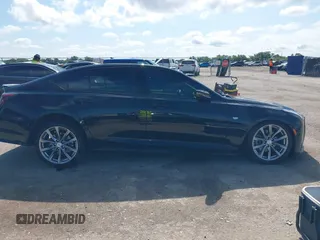 2025 Cadillac CT5 Sport с VIN 1G6DP5RK3S0100470, выставлен на аукционе IAAI как лот 42386329 с пробегом 6 143 миль миль и . История ставок и продаж доступна на DreamBid. Изображение 14.