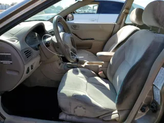 2002 Mitsubishi Galant ES z VIN 4A3AA46G12E123287, wystawiony jako Copart lot #74540784 z przebiegiem 259 181 mil mil oraz Szkoda całkowita • Salvage title. Historia ofert i sprzedaży dostępna na DreamBid. Obrazek 7.
