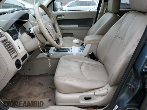 2011 Mercury Mariner Premier с VIN 4M2CN9HG7BKJ00344, выставлен на аукционе Copart как лот 47822215 с пробегом 107 070 миль миль и Списание • Salvage title. История ставок и продаж доступна на DreamBid. Изображение 7.
