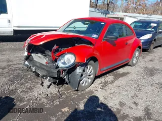 2017 Volkswagen Beetle 1.8T Fleet with VIN 3VWF17AT7HM618771, listed as a IAAI auction lot 41595088 with 67,943 mi miles. Bid and sale history available at carsss.com. Image 17.