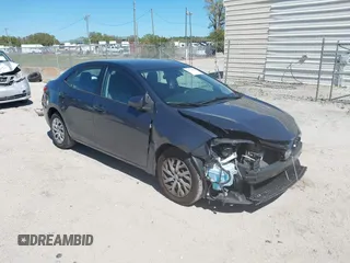 2018 Toyota Corolla L z VIN 2T1BURHE1JC015700, wystawiony jako IAAI lot #41732895 z przebiegiem 99 145 mil mil oraz . Historia ofert i sprzedaży dostępna na DreamBid. Obrazek 1.