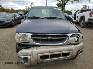 2000 Ford Explorer Eddie Bauer with VIN 1FMZU74E4YZA75510, listed as a Copart auction lot 75601964 with 196,180 mi miles and Salvage title. Bid and sale history available at DreamBid. Image 5.
