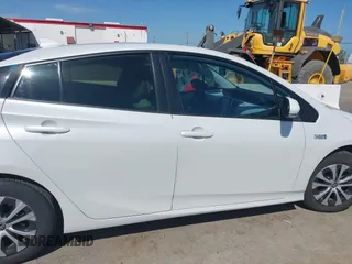 2021 Toyota Prius LE with VIN JTDKAMFP2M3177459, listed as a IAAI auction lot 42093828 with 65,501 mi miles and . Bid and sale history available at DreamBid. Image 13.