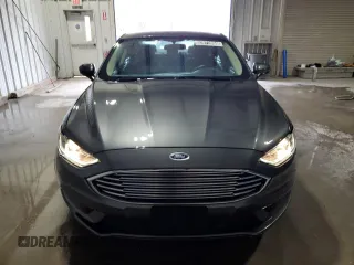 2018 Ford Fusion SE z VIN 3FA6P0H79JR111709, wystawiony jako Copart lot #52972855 z przebiegiem 116 442 mil mil oraz Czysty tytuł • Clean title. Historia ofert i sprzedaży dostępna na DreamBid. Obrazek 5.