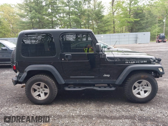 2006 Jeep Wrangler Rubicon z VIN 1J4FA69S76P749712, wystawiony jako IAAI lot #42240375 z przebiegiem 75 405 mil mil oraz . Historia ofert i sprzedaży dostępna na DreamBid. Obrazek 13.