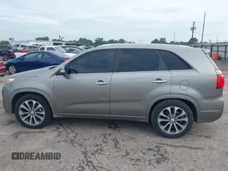 2014 Kia Sorento SX Limited with VIN 5XYKW4A73EG503792, listed as a IAAI auction lot 42684390 with 129,021 mi miles and . Bid and sale history available at DreamBid. Image 14.
