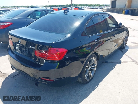 2013 BMW 3 Series 335i with VIN WBA3A9G56DNR97043, listed as a IAAI auction lot 42398325 with Not provided miles and . Bid and sale history available at DreamBid. Image 4.