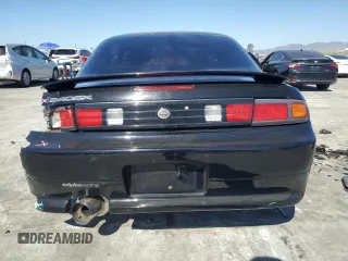 1997 Nissan 240SX z VIN JN1AS44D7VW103314, wystawiony jako Copart lot #47038255 z przebiegiem 151 152 mil mil oraz Szkody całkowita. Historia ofert i sprzedaży dostępna na DreamBid. Obrazek 6.