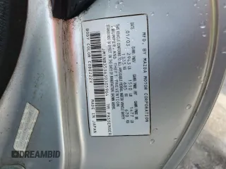 2003 Mazda MX-5 Miata Cloth z VIN JM1NB353630305964, wystawiony jako Copart lot #58517505 z przebiegiem 129 675 mil mil oraz Szkoda całkowita • Salvage title. Historia ofert i sprzedaży dostępna na DreamBid. Obrazek 12.