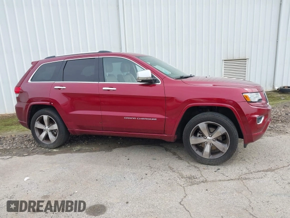 2015 Jeep Grand Cherokee High Altitude with VIN 1C4RJECG7FC884942, listed as a IAAI auction lot 41852796 with 110,454 mi miles. Bid and sale history available at carsss.com. Image 13.