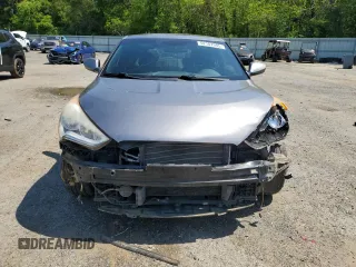 2016 Hyundai Veloster z VIN KMHTC6AD4GU273160, wystawiony jako Copart lot #52107985 z przebiegiem 120 884 mil mil oraz Szkoda całkowita • Salvage title. Historia ofert i sprzedaży dostępna na DreamBid. Obrazek 5.